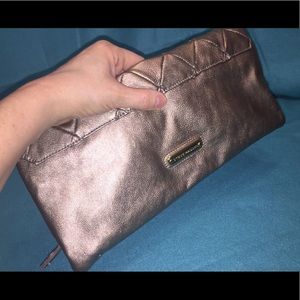 Steve Madden’s Bronze Quilted Folding Clutch